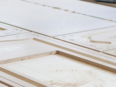 Usługi stolarskie Bydgoszcz – cięcie płyt, oklejanie i obróbka CNC